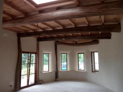 Low-cost housing with earth & soul